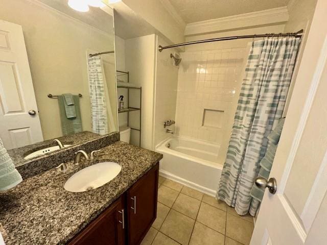 bathroom featuring tile patterned floors, shower / bath combo with shower curtain, ornamental molding, and vanity