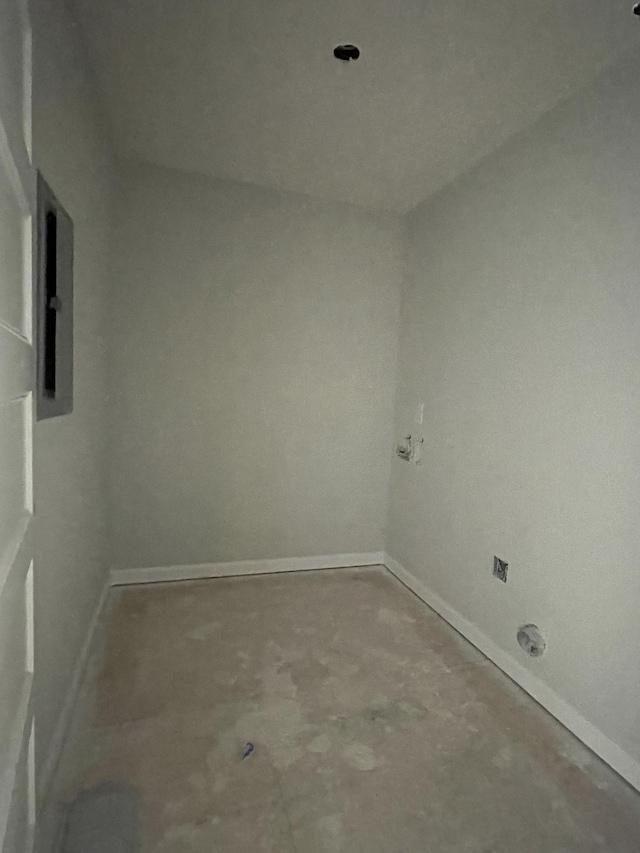 spare room featuring concrete flooring