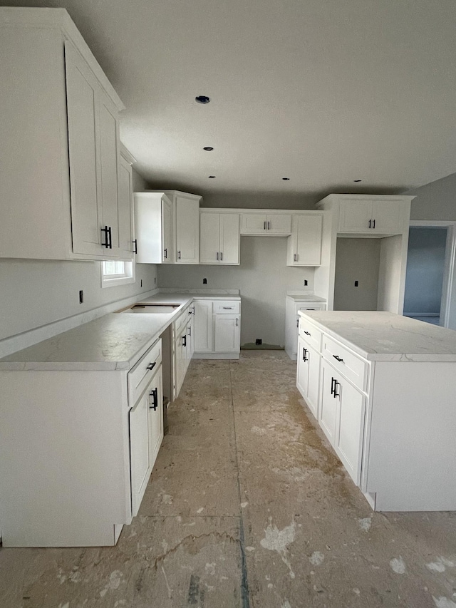 kitchen featuring white cabinets