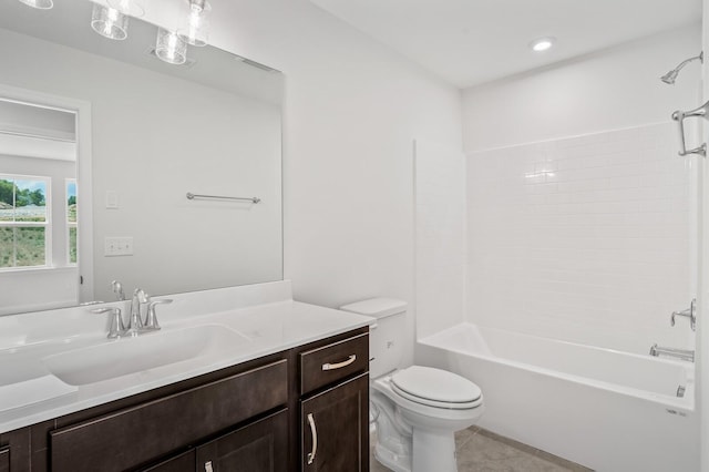 full bathroom featuring tile patterned floors, vanity, toilet, and shower / tub combination