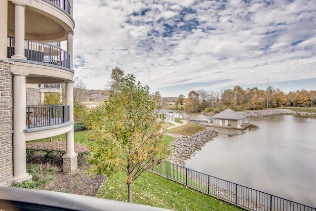 exterior space with a dock and fence