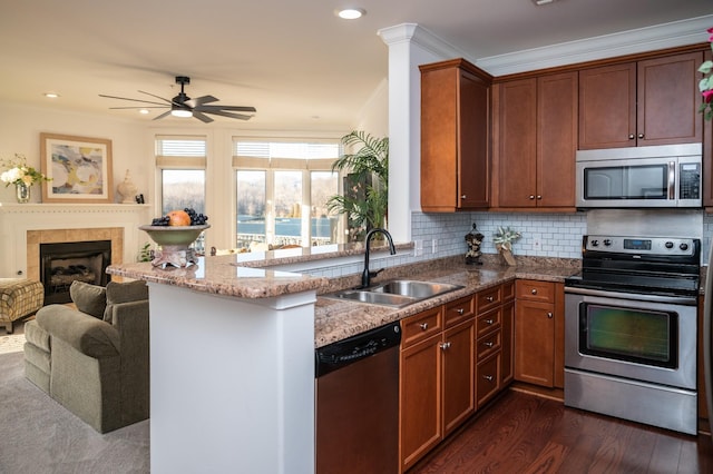 400 Warioto Way Unit 206, Ashland City, TN 37015 - kitchen featuring open floor plan, dark wood-type flooring, a sink, ceiling fan, and appliances with stainless steel finishes