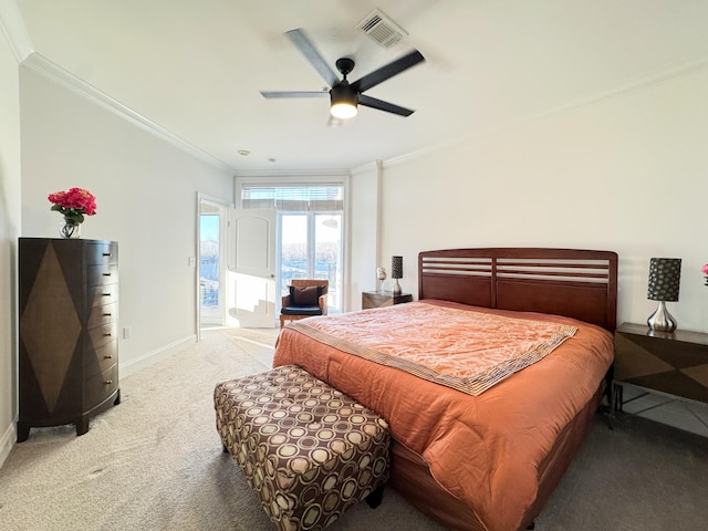 400 Warioto Way Unit 206, Ashland City, TN 37015 - bedroom with visible vents, carpet, baseboards, ornamental molding, and access to exterior