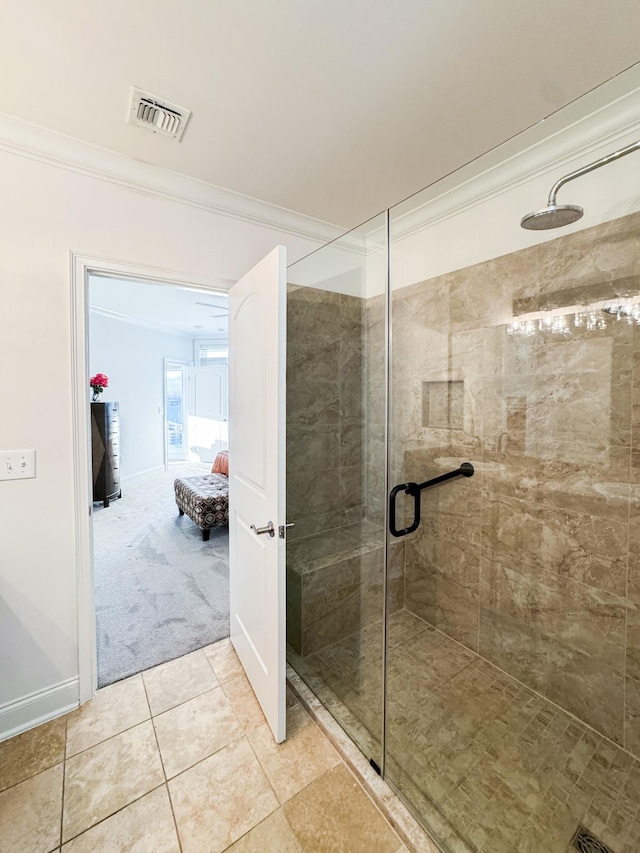 400 Warioto Way Unit 206, Ashland City, TN 37015 - full bathroom with tile patterned flooring, crown molding, baseboards, a stall shower, and visible vents