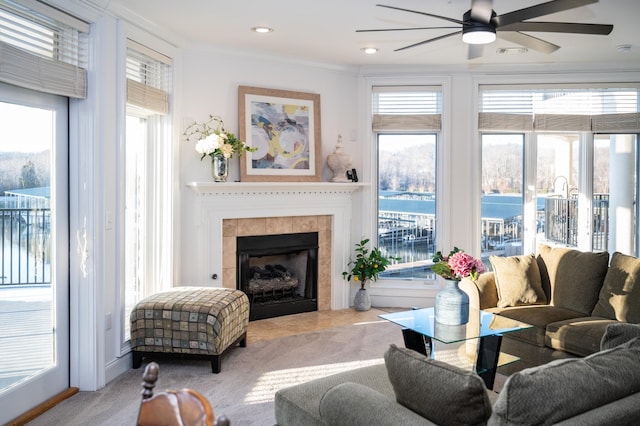 400 Warioto Way Unit 206, Ashland City, TN 37015 - carpeted living area with a ceiling fan, visible vents, crown molding, and a wealth of natural light
