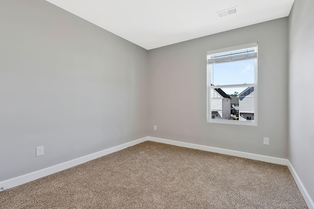 spare room with carpet flooring