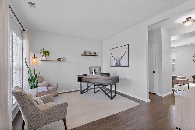 home office featuring dark hardwood / wood-style floors