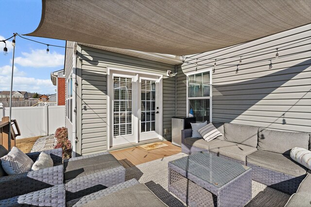 view of patio / terrace featuring outdoor lounge area and french doors