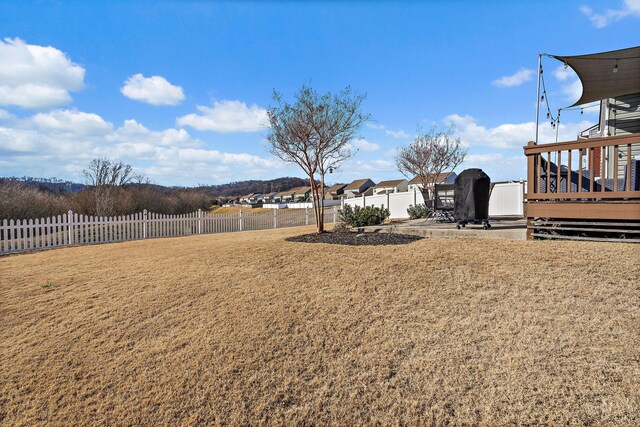 view of yard featuring a deck