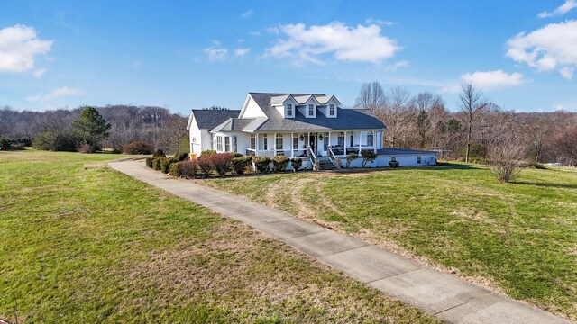 cape cod house with a porch and a front yard