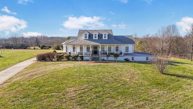 cape cod-style house with a front lawn and covered porch