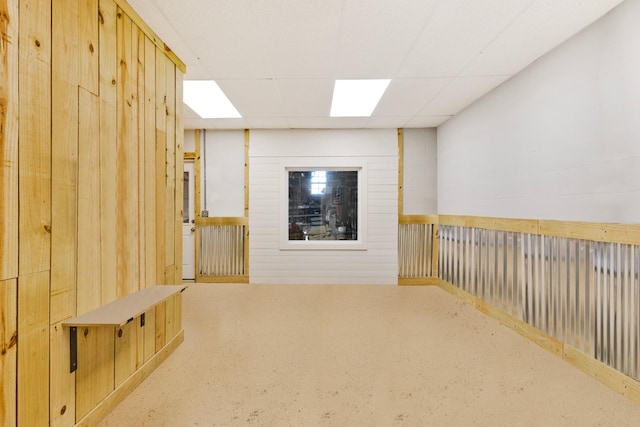 basement featuring a drop ceiling