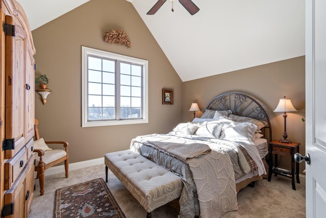 bedroom featuring lofted ceiling, light colored carpet, and ceiling fan