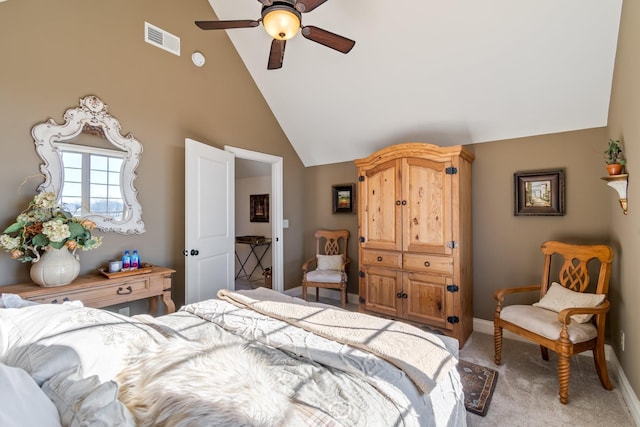 carpeted bedroom with high vaulted ceiling and ceiling fan