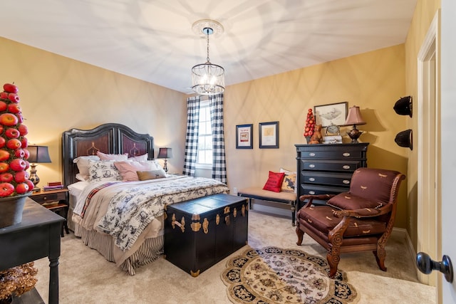 bedroom with light carpet and a notable chandelier