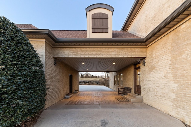 property entrance featuring a patio area