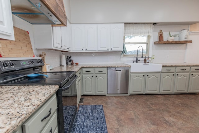 kitchen with dishwasher, black electric range oven, ventilation hood, sink, and white cabinetry