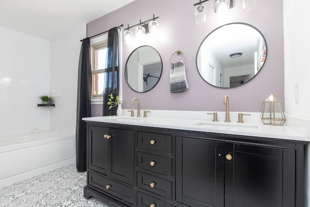 bathroom with vanity and tub / shower combination