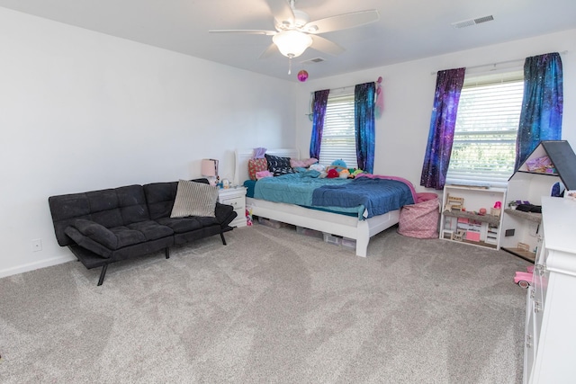 bedroom featuring ceiling fan and carpet floors