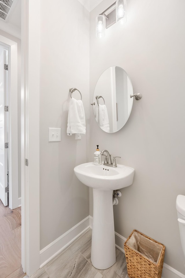 bathroom with sink and toilet