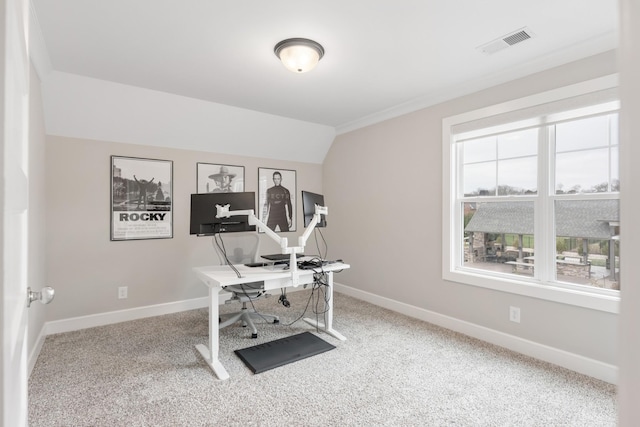 carpeted office space with lofted ceiling