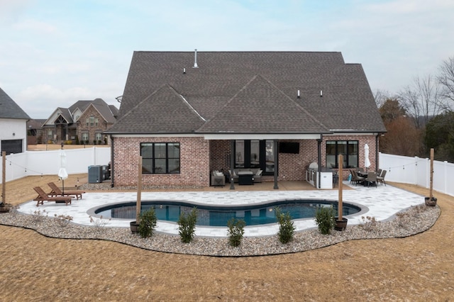 view of swimming pool featuring central air condition unit, an outdoor living space, and a patio