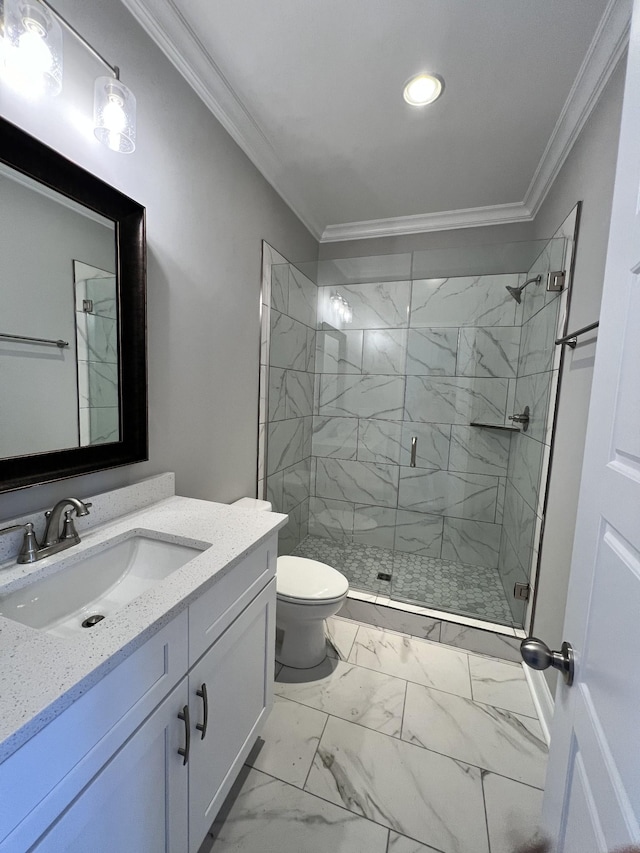 bathroom featuring toilet, a shower with door, vanity, and ornamental molding