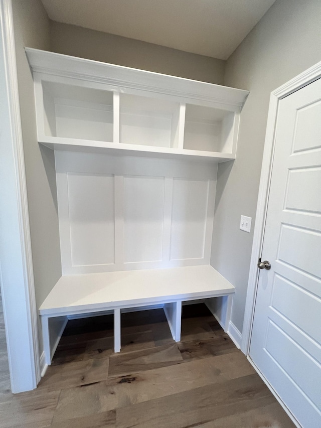 mudroom with wood-type flooring