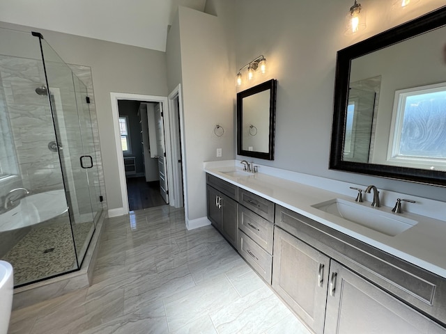 bathroom featuring vanity and walk in shower