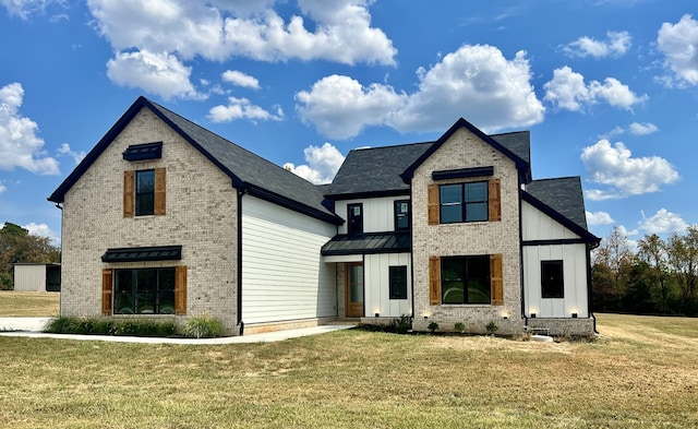 view of front of house with a front lawn