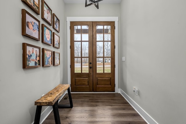 doorway to outside with french doors and dark wood-type flooring