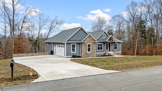 craftsman-style home featuring a front lawn and a garage