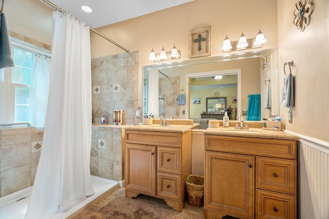 bathroom featuring a shower with curtain and vanity