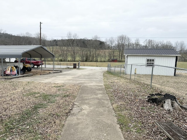 exterior space with a carport