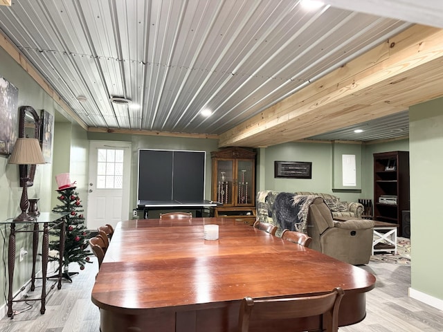 dining space with light wood-type flooring
