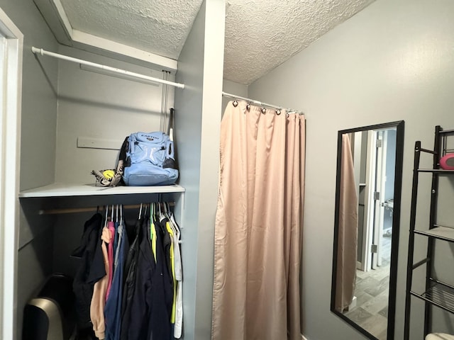 bathroom featuring a textured ceiling
