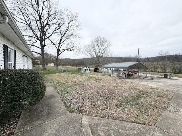 view of yard with a carport