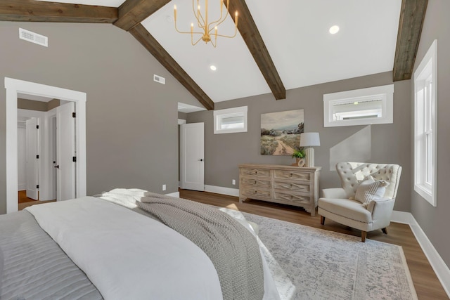 bedroom with high vaulted ceiling, beamed ceiling, a chandelier, and hardwood / wood-style flooring