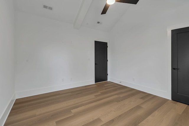 spare room featuring ceiling fan, beamed ceiling, high vaulted ceiling, and hardwood / wood-style flooring