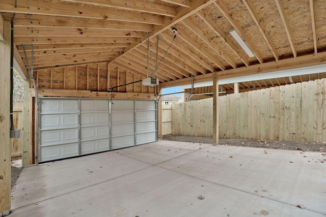 garage featuring a garage door opener