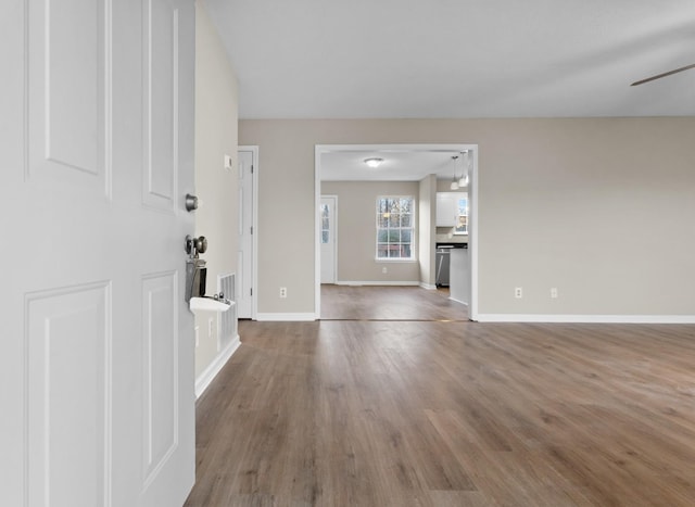 entryway featuring ceiling fan and wood-type flooring