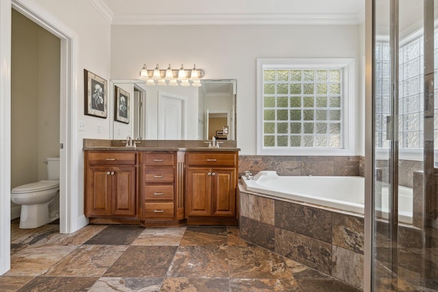 full bathroom with ornamental molding, toilet, vanity, and shower with separate bathtub