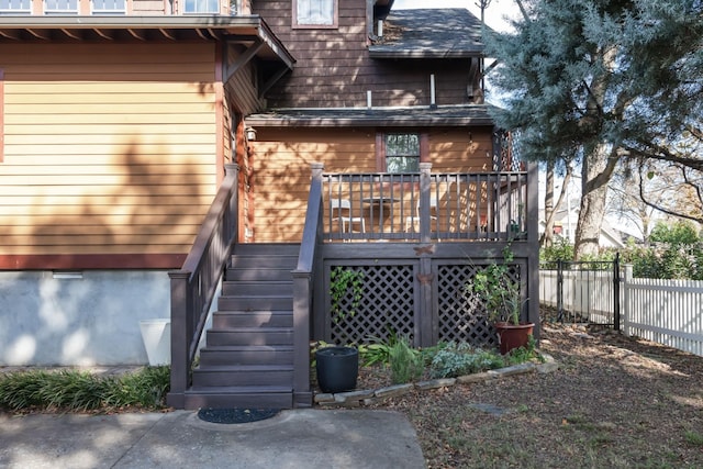 back of house featuring a deck