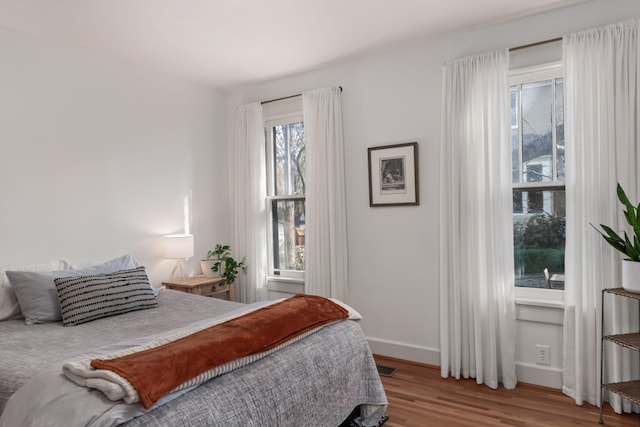 bedroom featuring hardwood / wood-style flooring