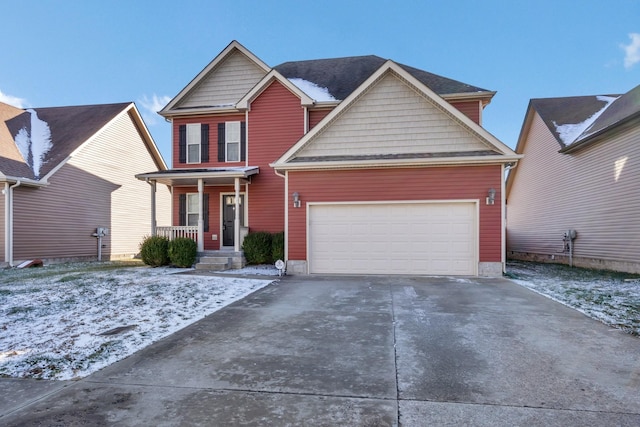 view of front facade with a garage and covered porch