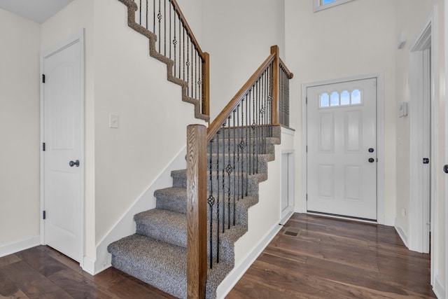 foyer featuring dark hardwood / wood-style floors