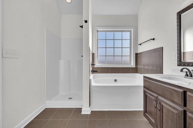 bathroom with vanity, tile patterned flooring, and independent shower and bath