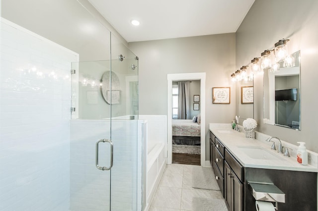 bathroom with vanity, tile patterned floors, and an enclosed shower