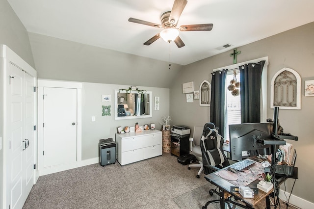 carpeted home office featuring ceiling fan and vaulted ceiling