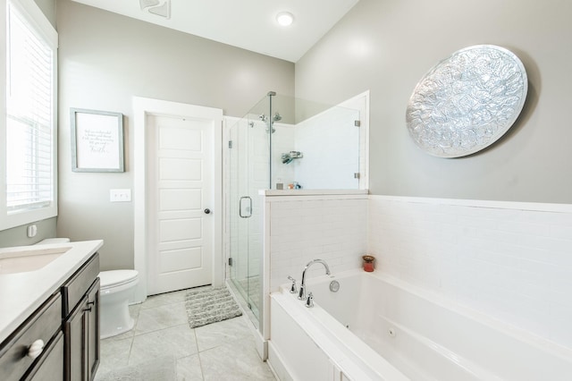 full bathroom with vanity, tile patterned flooring, plus walk in shower, and toilet